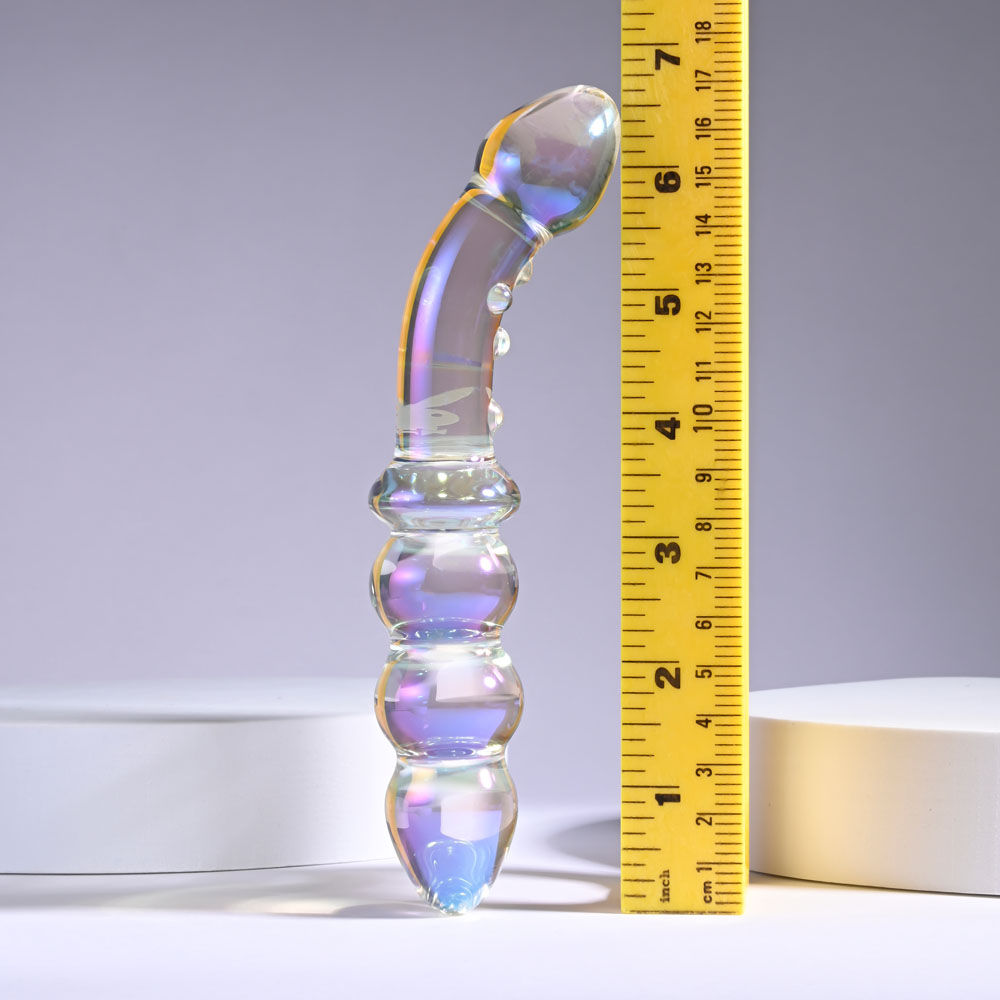 Front view of the glass anal beads with ruler for size reference on a grey light pink background | Flirty Bay, anal plug adult store Australia